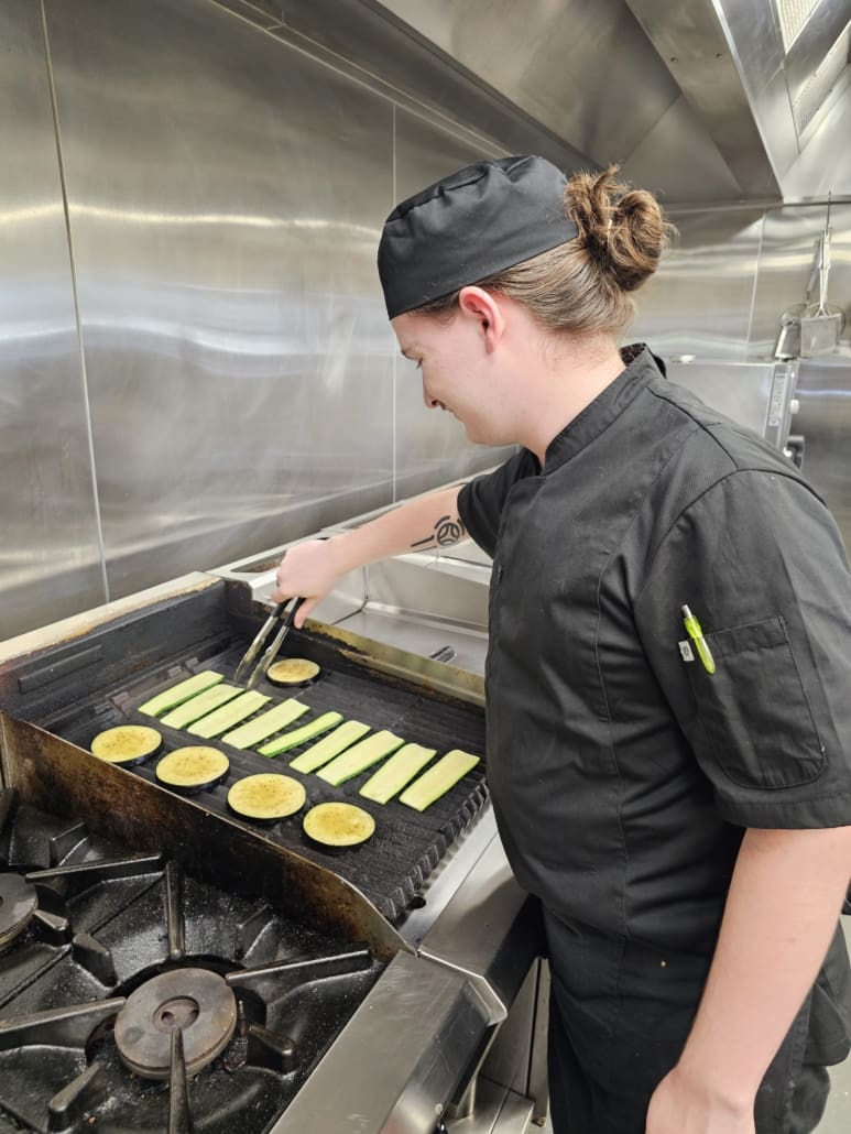 Chef cooking on grill