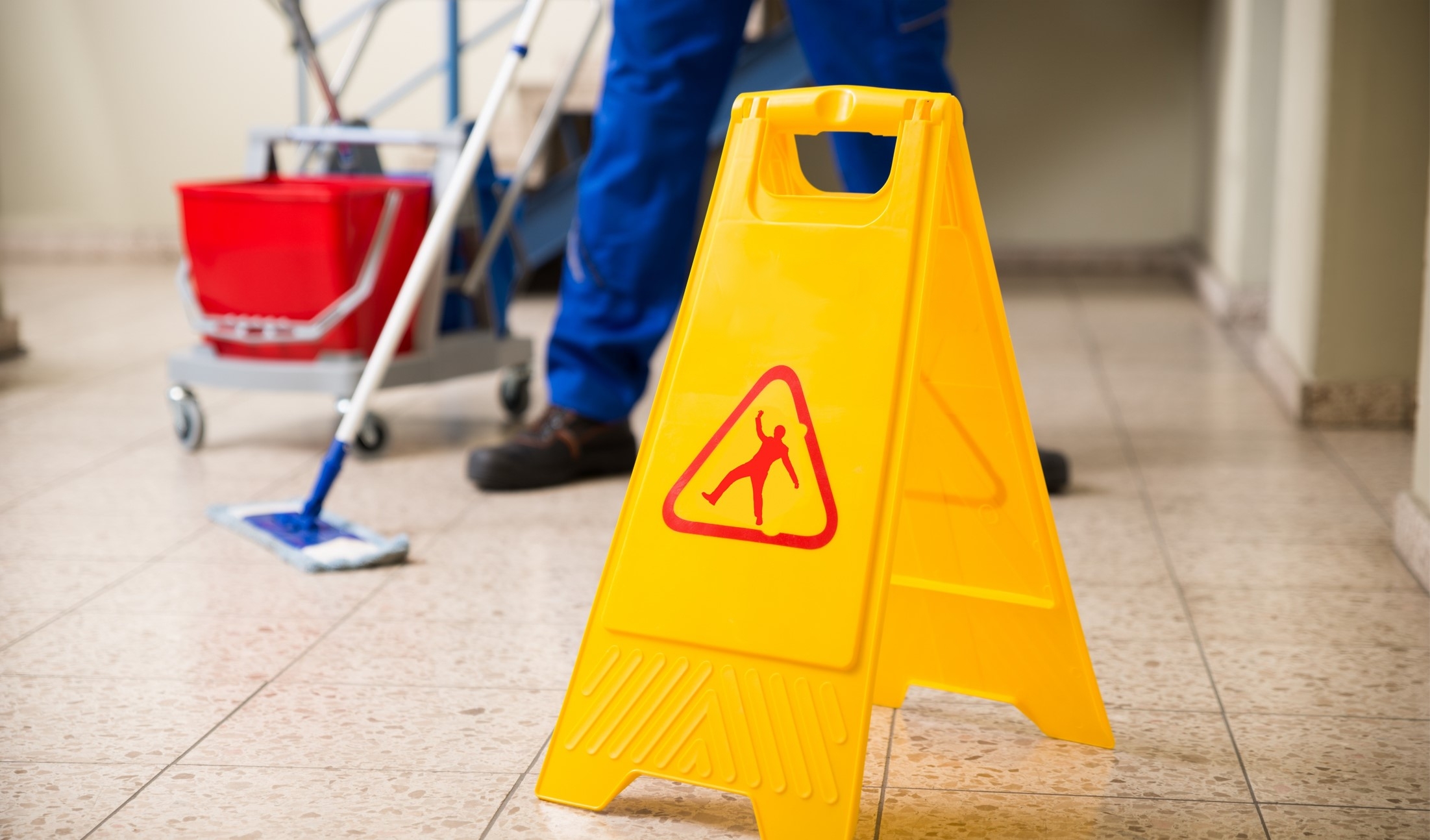 cleaning sign pictured and mop